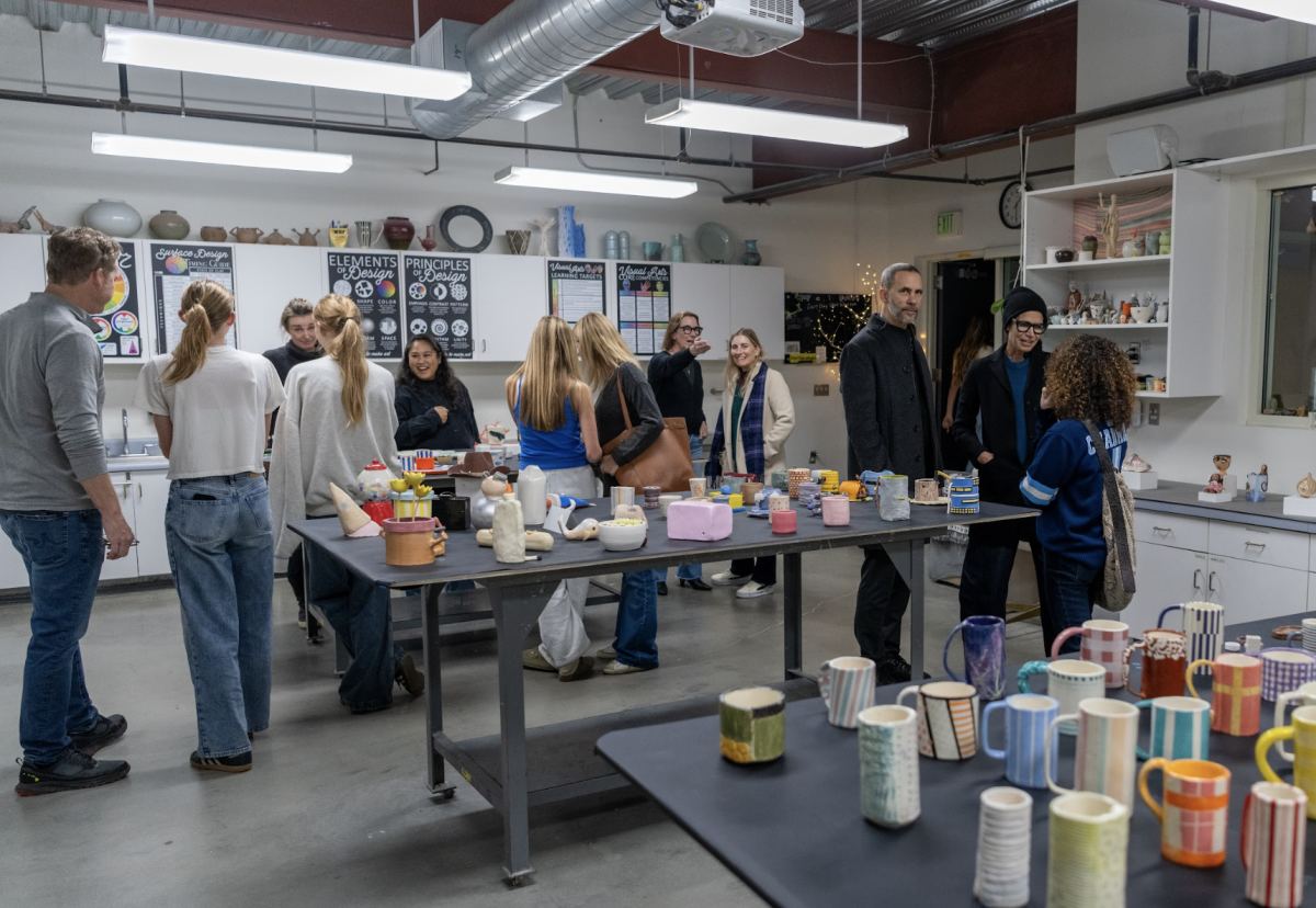 Students, faculty, and families all being wowed by the creative ceramic pieces. 